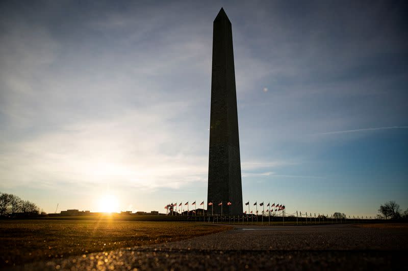 FILE PHOTO: The Washington Monument is pictured as the sun rises