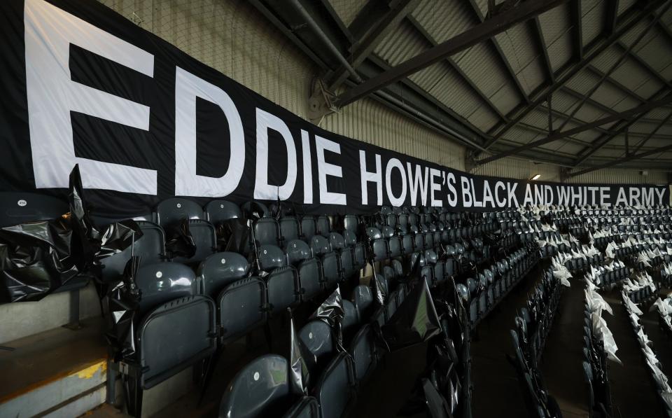 General view inside the stadium with a banner displaying 'Eddie Howe's Black and White Army' prior to the Premier League match between Newcastle United and Leicester City at St. James Park - Alex Livesey/Getty Images