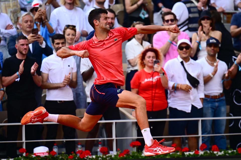 Novak Djokovic celebrates his victory over Casper Ruud in the French Open men's singles final on Sunday.