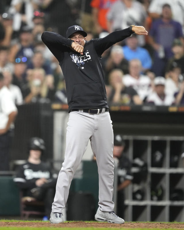 Yankees' Boone draws in dirt, gives his best strike three call