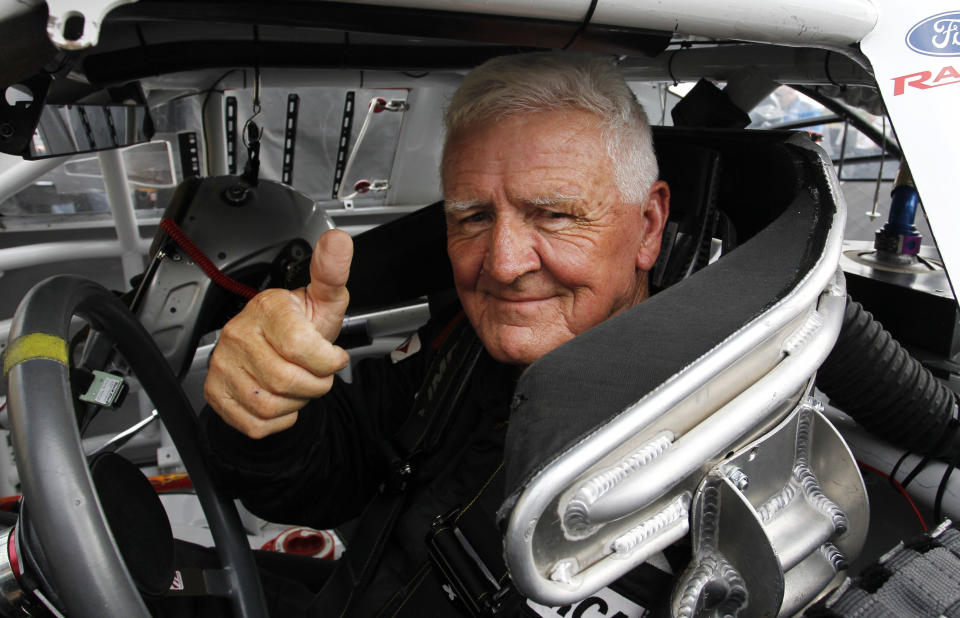 ARCA driver James Hylton gives a thumbs up while sitting in his race car during practice at Kansas Speedway in Kansas City, Kan., Friday, Oct. 4, 2013. The 79-year-old will retire following Friday’s ARCA Kansas Lottery 98.9 race. (AP Photo/Colin E. Braley)