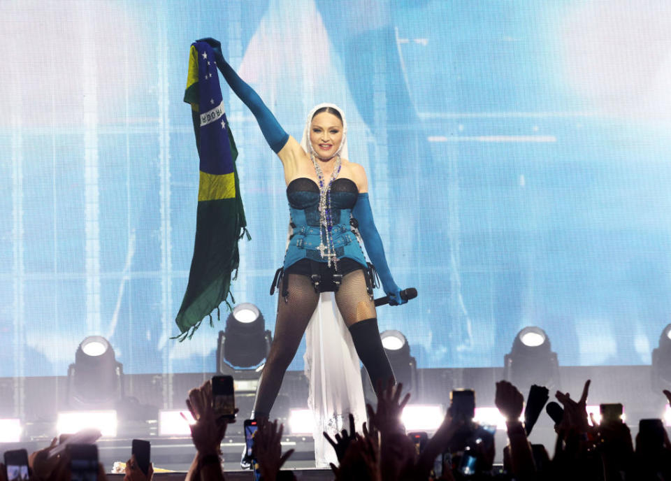 Madonna performs during "The Celebration Tour" on May 4 in Rio de Janeiro, Jean Paul Gaultier, corset