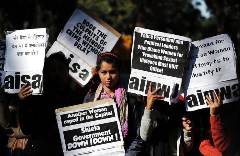 Indian activists protest in New Delhi on December 19, 2012. Riot police have fired water cannon at a protest in New Delhi over the gang-rape of a 23-year-old student who was left fighting for her life as anger against the brutal attack grew across India