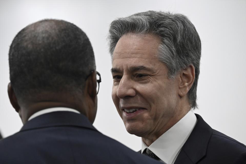 US Secretary of State Antony Blinken, right, speaks to Cape Verde Prime Minister Ulisses Correia e Silva, during a meeting at the Government Palace in Praia, Cape Verde, Monday, Jan. 22, 2024. (Andrew Caballero-Reynolds/Pool Photo via AP)