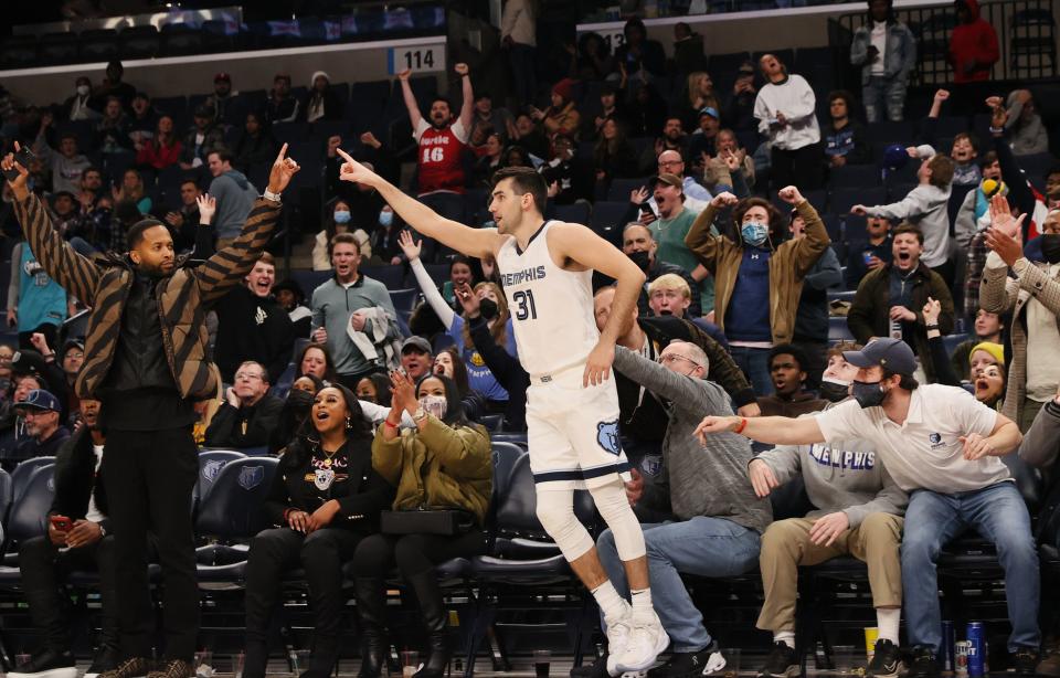 Memphis Grizzlies guard Dakota Mathias is cheered on by fans after hitting his second 3-pointer against the Detroit Pistons at FedExForum on Thursday, Jan. 6, 2022.