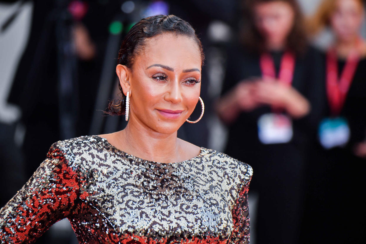 VENICE, ITALY - AUGUST 28: Melanie Brown walks the red carpet ahead of the opening ceremony during the 76th Venice Film Festival at Sala Casino on August 28, 2019 in Venice, Italy. (Photo by Stephane Cardinale - Corbis/Corbis via Getty Images)