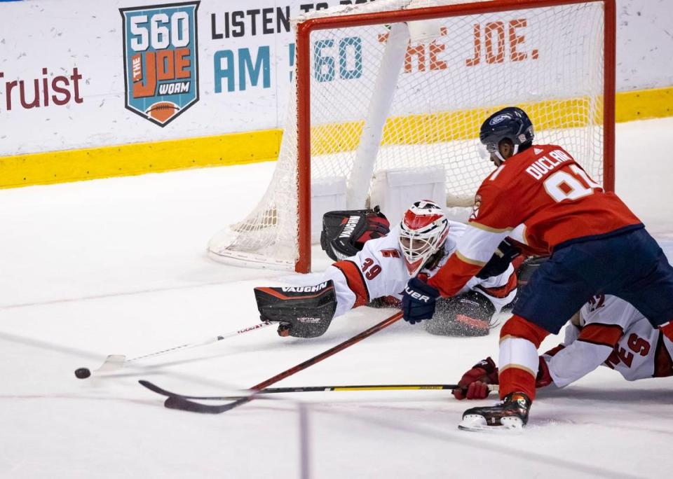 Carolina Hurricanes goaltender Alex Nedeljkovic (39) blocks a shot by Florida Panthers left wing Anthony Duclair (91) during the first period of their NHL game at the BB&T Center on Thursday, April 21, 2021 in Sunrise, Fl.