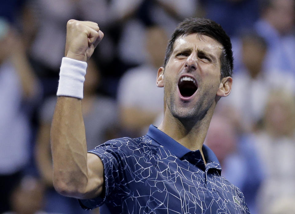 Novak Djokovic, of Serbia, celebrates after defeating Kei Nishikori, of Japan, during the semifinals of the U.S. Open tennis tournament, Friday, Sept. 7, 2018, in New York. (AP Photo/Seth Wenig)