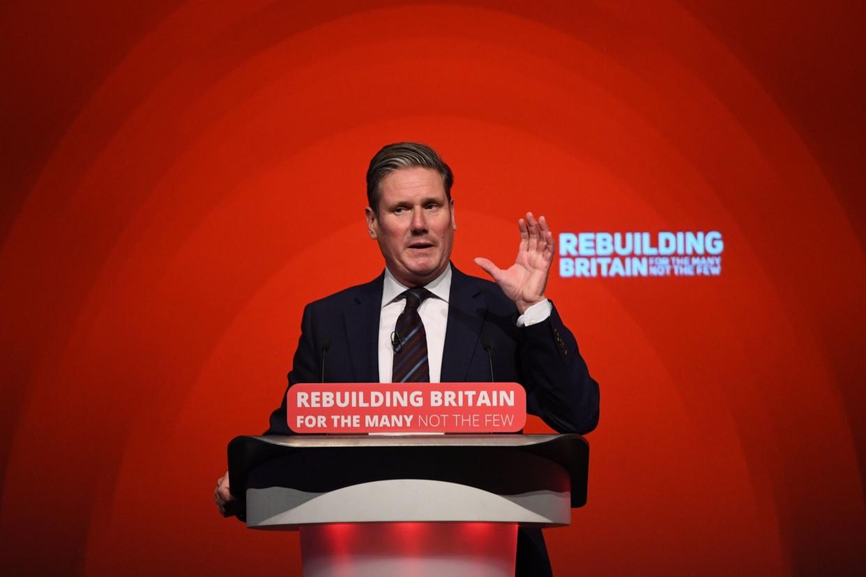 Pledge: Sir Keir Starmer at the conference today: PA