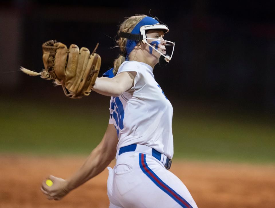 Jayden Heavener (00) pitches during the Tate vs Pace softball game at Pace High School on Tuesday, May 3, 2022.