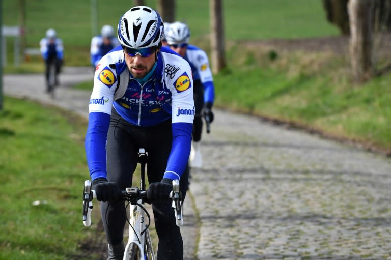 Belgian Tom Boonen of Quick-Step Floors rides his bike during a track reconnaissance at the cobblestones area in Zottegem, Belgium on February 24, 2017