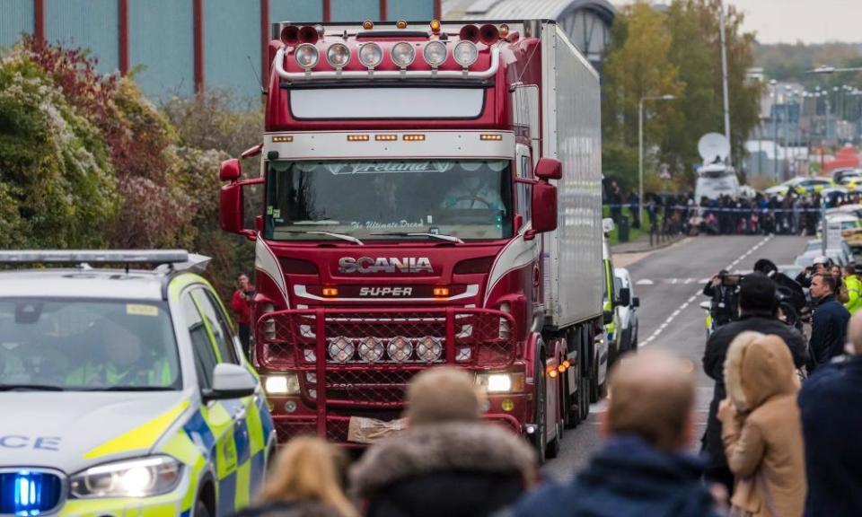 The lorry is driven away from the scene