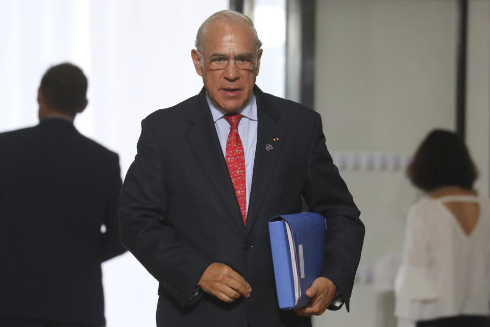 The Organization for Economic Co-operation and Development (OECD) Secretary General Jose Angel Gurria arrives in Biarritz, southwestern France, Sunday Aug. 25, 2019. Fissures emerged among G-7 leaders on Sunday over how to deal with the threat of a global recession, China and Iran, casting deep uncertainty over this year's summit of the world's major democracies as U.S. President Donald Trump appeared increasingly isolated among a gathering of the country's closest allies. (Ludovic Marin/Pool via AP)