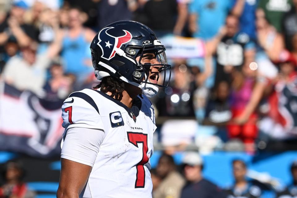 Oct 29, 2023; Charlotte, North Carolina, USA; Houston Texans quarterback C.J. Stroud (7) reacts after scoring a touchdown in the third quarter at Bank of America Stadium. Mandatory Credit: Bob Donnan-USA TODAY Sports