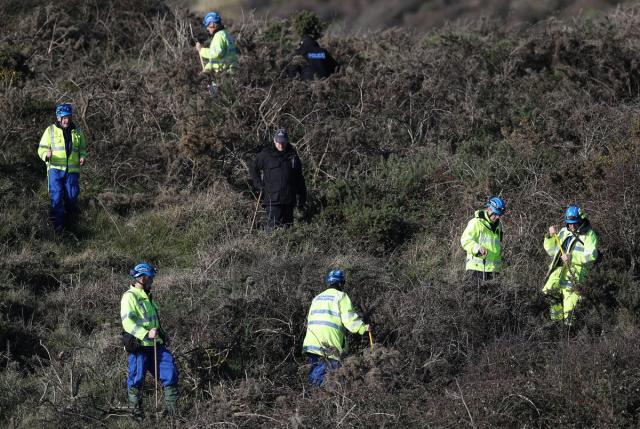 Police conduct a fingertip search during their investigation into Ms Pope-Sutherland’s disappearance (Andrew Matthews/PA) (PA Archive)