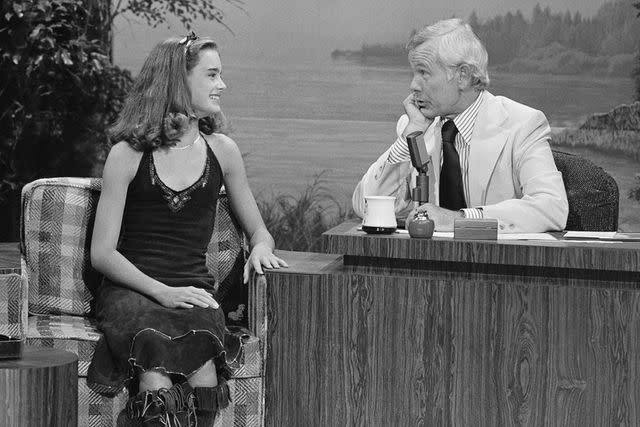 <p>Frank Carroll/NBCU Photo Bank/NBCUniversal via Getty</p> Brooke Shields and Johnny Carson in 1978