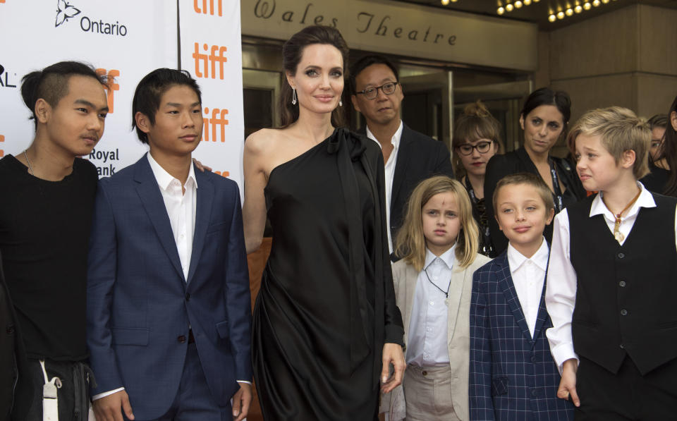 Jolie poses with some of her children at the&nbsp;Toronto International Film Festival. (Photo: VALERIE MACON via Getty Images)