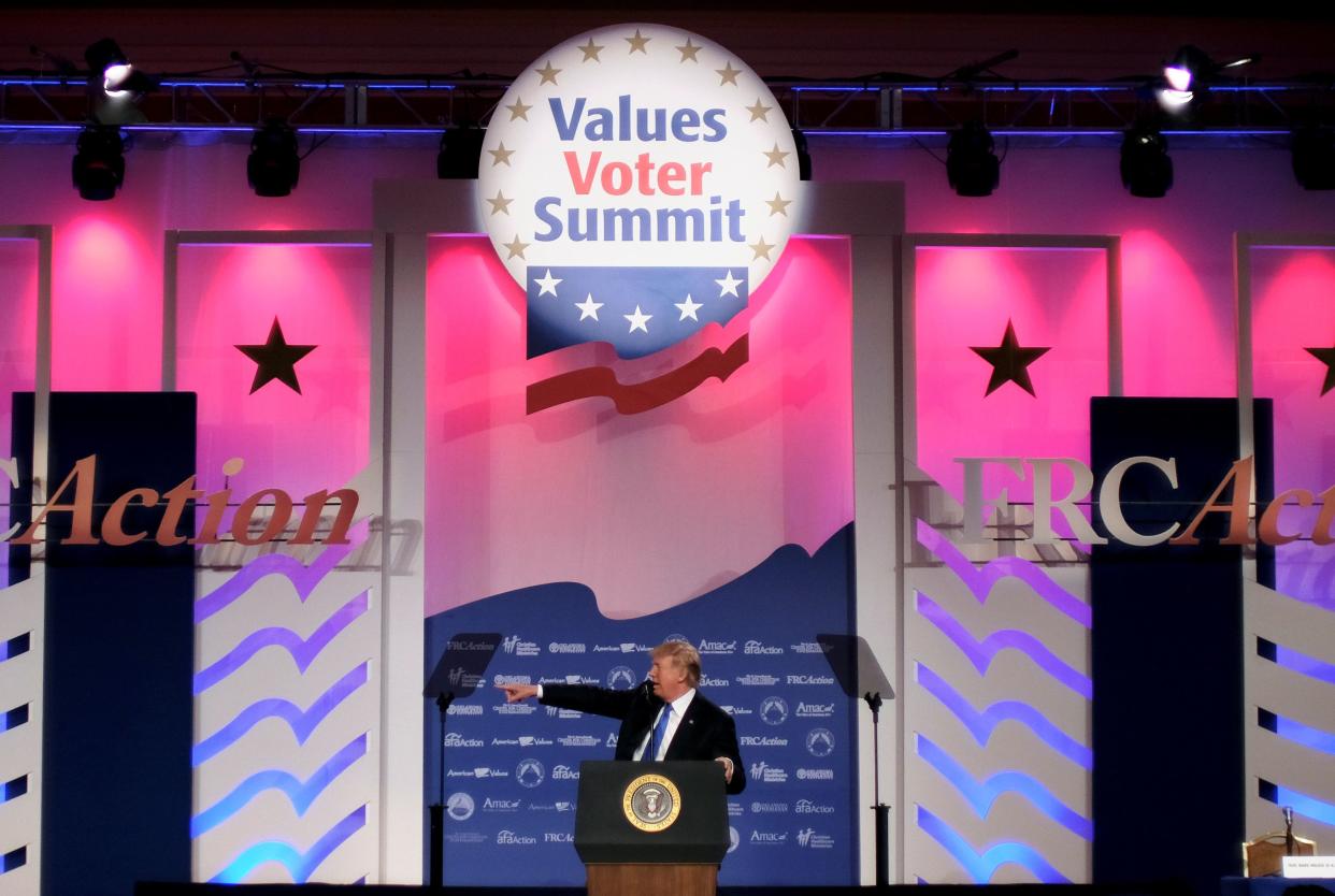 President Donald Trump addresses the Values Voter Summit of the Family Research Council on Friday. (Photo: JAMES LAWLER DUGGAN / Reuters)