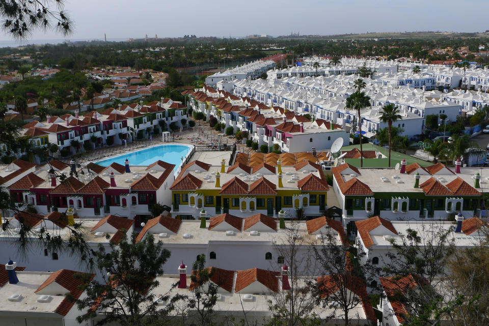 February 7: 'Intensive Crops' by jjuanchu. Tourist buildings in the beach take up a vast area. Each building is identical creating a monotonous and repetitive landscape - which harms the natural scenery. Maspalomas, Canary Islands.