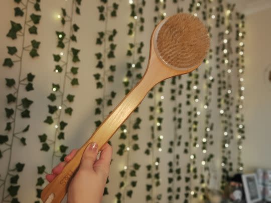 You'll finally be able to reach your back while showering thanks to this long-handled brush
