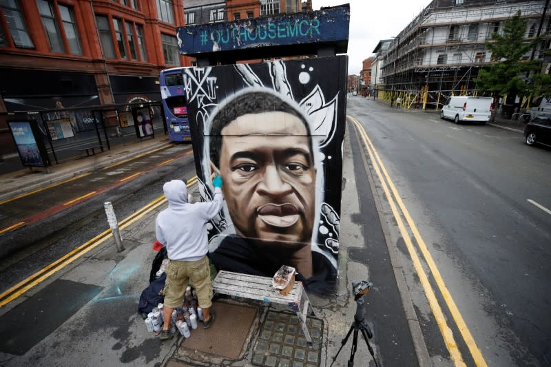 A mural of George Floyd who died in police custody in Minneapolis is seen in Stevenson Square