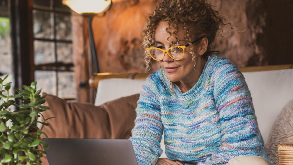 woman chatting on her laptop for her chat work from home jobs