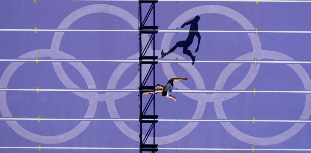 Karsten Warholm, of Norway, competes in a men's 400-meter hurdles heat at the Summer Olympics on Sunday. 