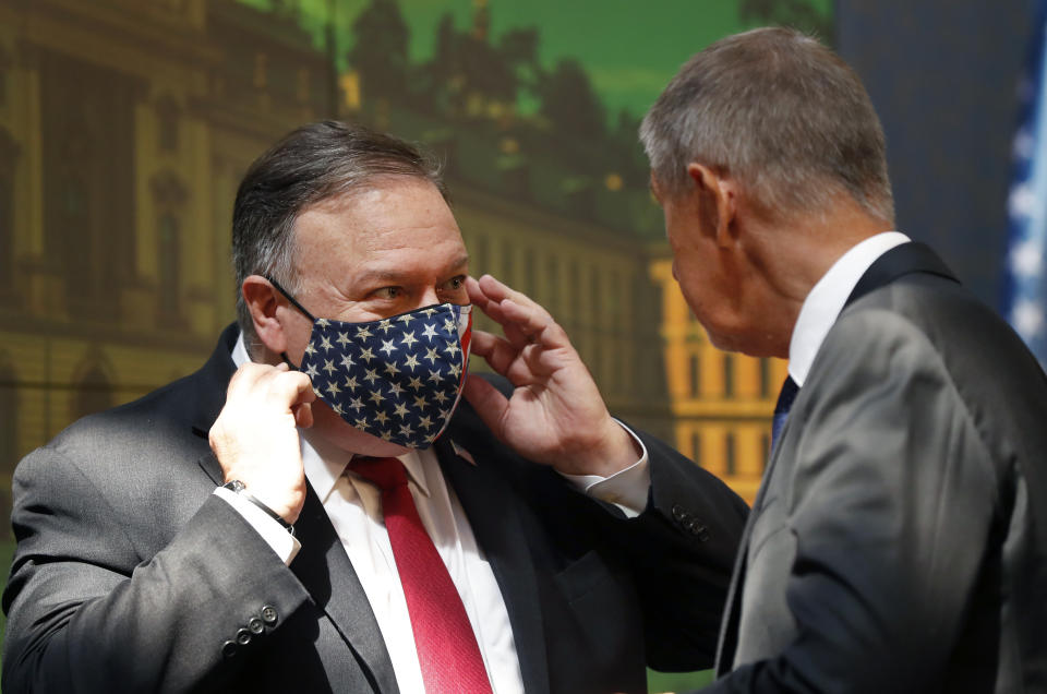 U.S. Secretary of State Mike Pompeo, left, and the Prime Minister of Czech Republic Andrej Babis, right, speak during a press conference as part of a meeting in Prague, Czech Republic, Wednesday, Aug. 12, 2020. U.S. Secretary of State Mike Pompeo is in Czech Republic at the start of a four-nation tour of Europe. Slovenia, Austria and Poland are the other stations of the trip. (AP Photo/Petr David Josek, Pool)