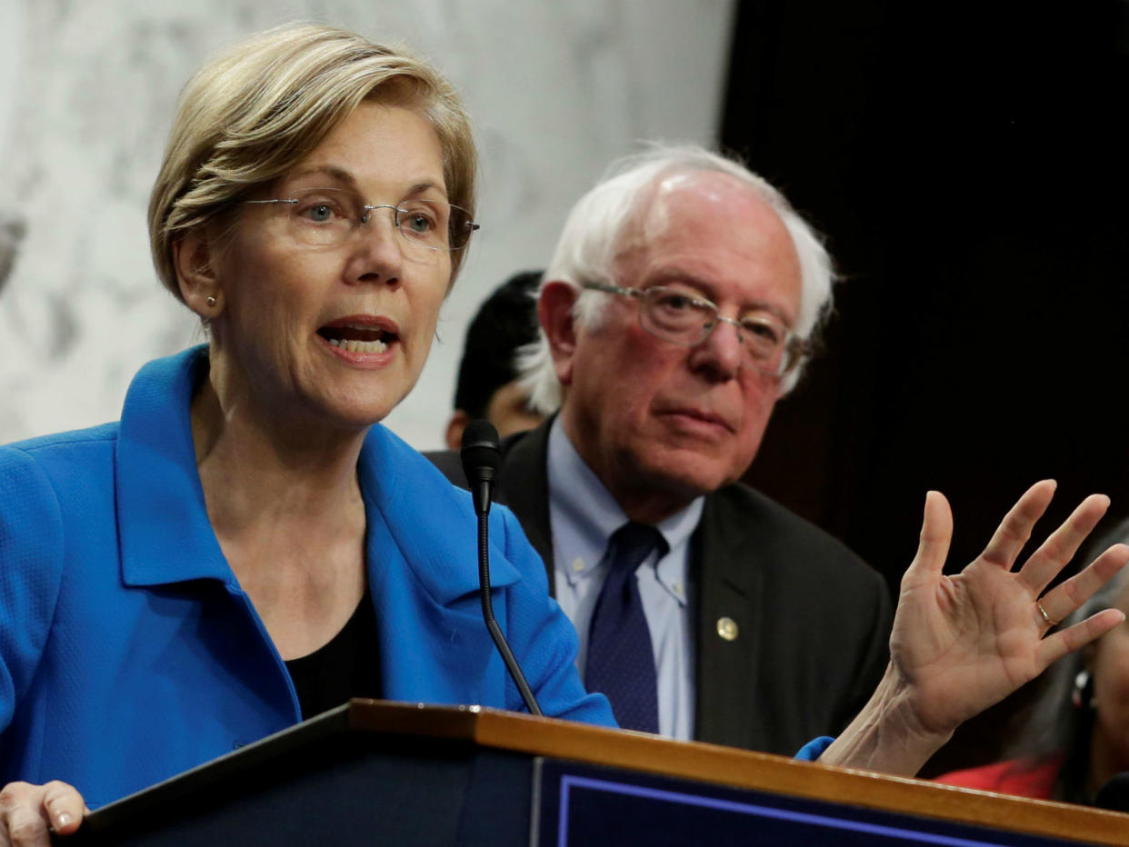 Senator Elizabeth Warren and Senator Bernie Sanders promote universal healthcare in Washington on September 13, 2017: REUTERS/Yuri Gripas