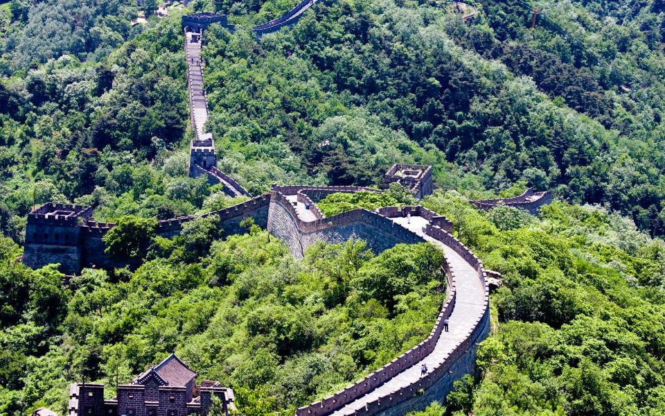 <p>Originally built as a wartime defense, the Great Wall of China features many towers and passes. When Emperor Qin Shi Huang first proposed the so-called Long Wall, it was meant to defend the Chinese states against nomadic tribes from the north.</p> <p>During the Han Dynasty, (between 206 B.C. and 220 A.D.) the Great Wall was extended to protect the Silk Road trade. The Ming Dynasty, which “took a largely defensive stance,” according to <a rel="nofollow noopener" href="http://www.history.com/topics/great-wall-of-china" target="_blank" data-ylk="slk:History.com;elm:context_link;itc:0;sec:content-canvas" class="link ">History.com</a>, is known for not only extending the Great Wall, but also repairing and reinforcing existing structures.</p>