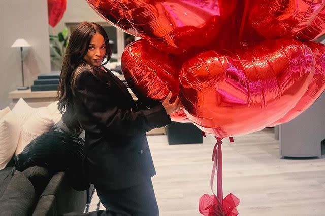 <p>Ciara/Instagram</p> Ciara poses with her anniversary balloons