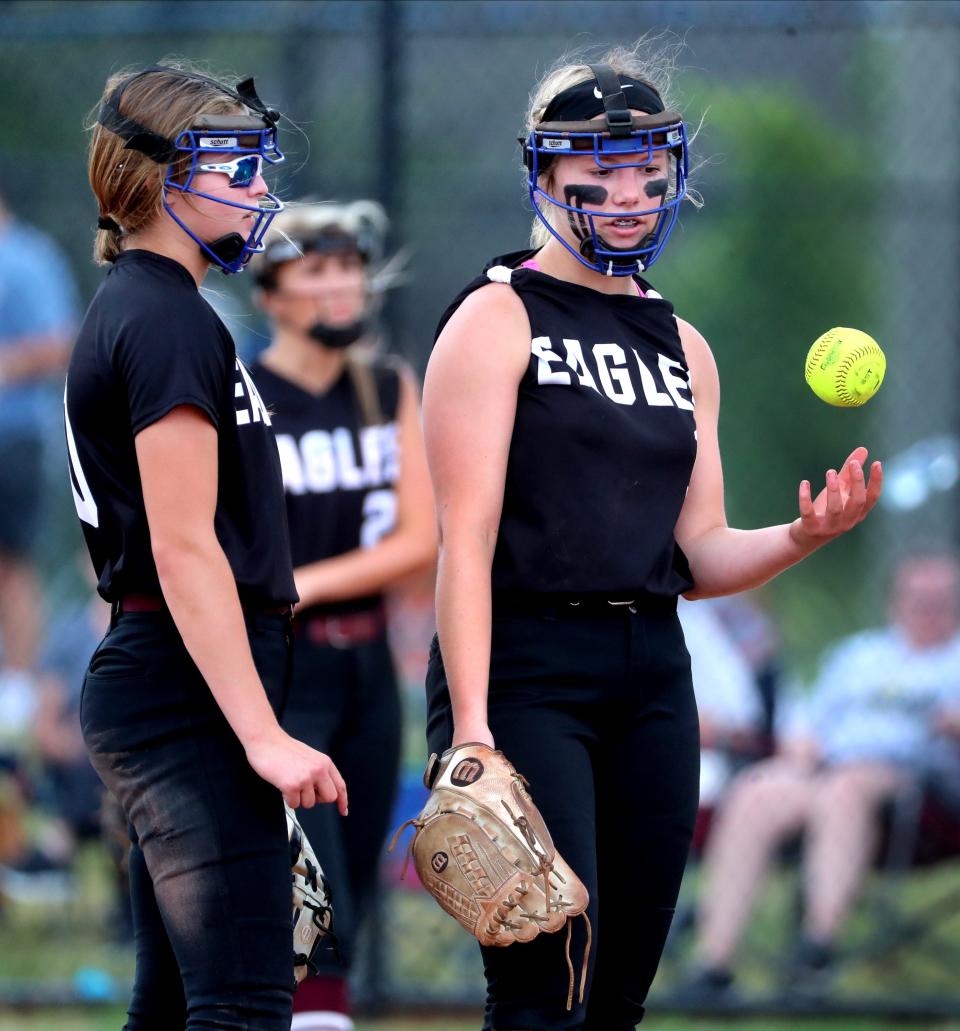 Eagleville's second baseman Brinli Bain (30) and Eagleville's pitcher Addisyn Linton (11) talk at the pitcher's circle during an inning in the game against Dresden in the 2022 Division 1 Class 1A State Softball Tournament on Wednesday, May 25, 2022. 