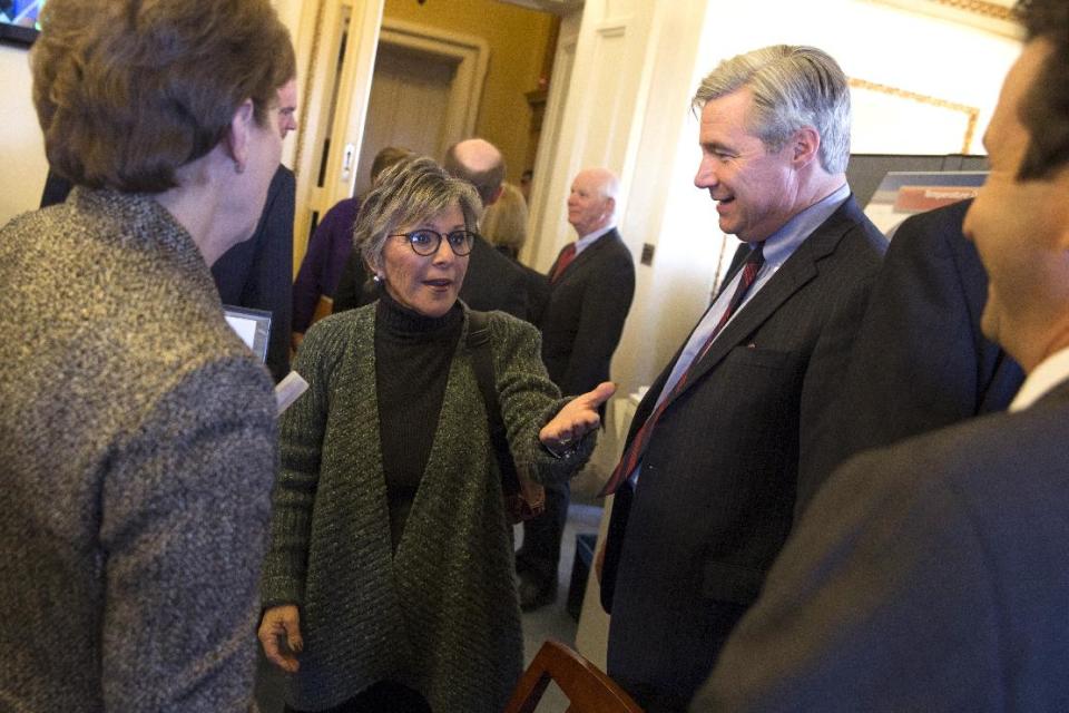 Senate Environment and Public Works Committee Chairman Sen. Barbara Boxer, D-Calif. talks with Senators during a meeting of the Senate Climate Action Task Force prior to taking to the Senate Floor all night to urge action on climate change on Capitol Hill on Monday, March 10, 2014, in Washington. From left, Sen. Jeanne Shaheen, D-N.H, Boxer, Sen. Sheldon Whitehouse, D-R.I., and Sen. Brian Schatz, D-Hawaii. (AP Photo/ Evan Vucci)