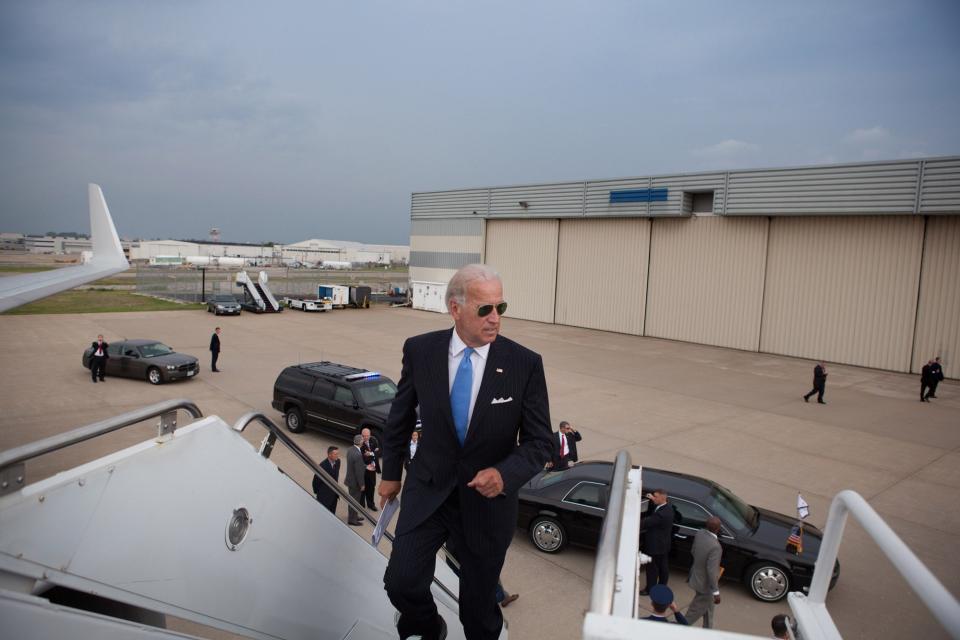 Welcome aboard: Vice President Joe Biden jogs up the stairs to Air Force Two at Lambert St. Louis International Airport, in St. Louis, Missouri, August 20,&nbsp;2010.