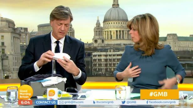 Richard Madeley demonstrates a piece of male breastfeeding equipment