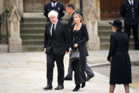 <p>Former prime ministers Theresa May, right, and Boris Johnson with his wife Carrie Johnson arriving at the Queen's state funeral. (Getty)</p> 