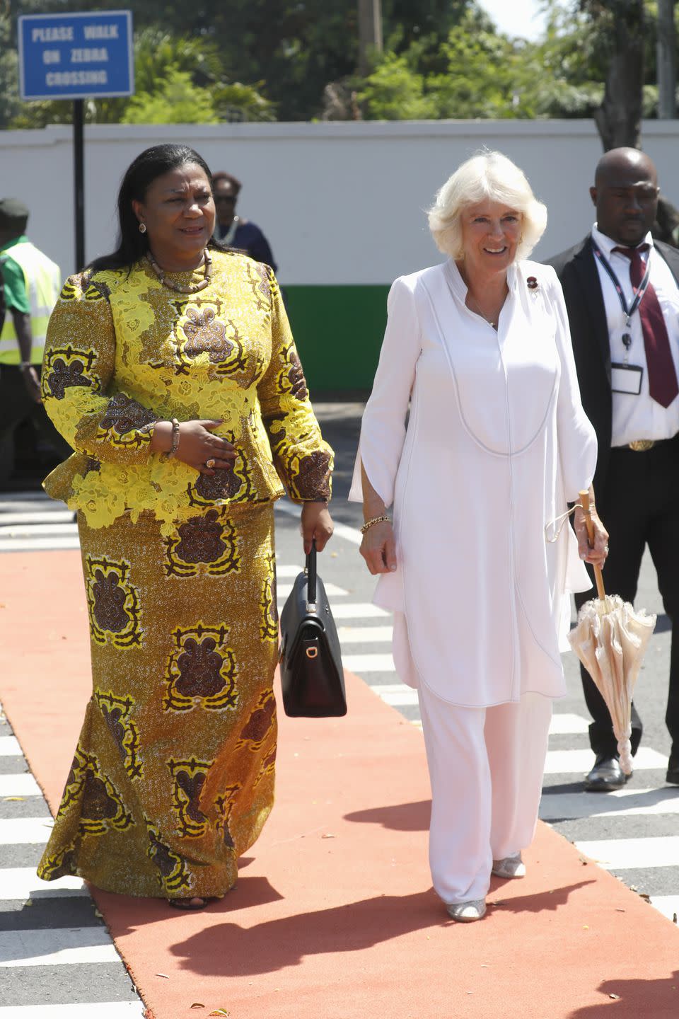 <p>The First Lady of Ghana and Duchess of Cornwall arrive at a <a rel="nofollow noopener" href="https://www.thercs.org/our-work/events/view/commonwealth-big-lunches" target="_blank" data-ylk="slk:Commonwealth Big Lunch;elm:context_link;itc:0;sec:content-canvas" class="link ">Commonwealth Big Lunch</a> at the Ghana International School in Accra. </p>