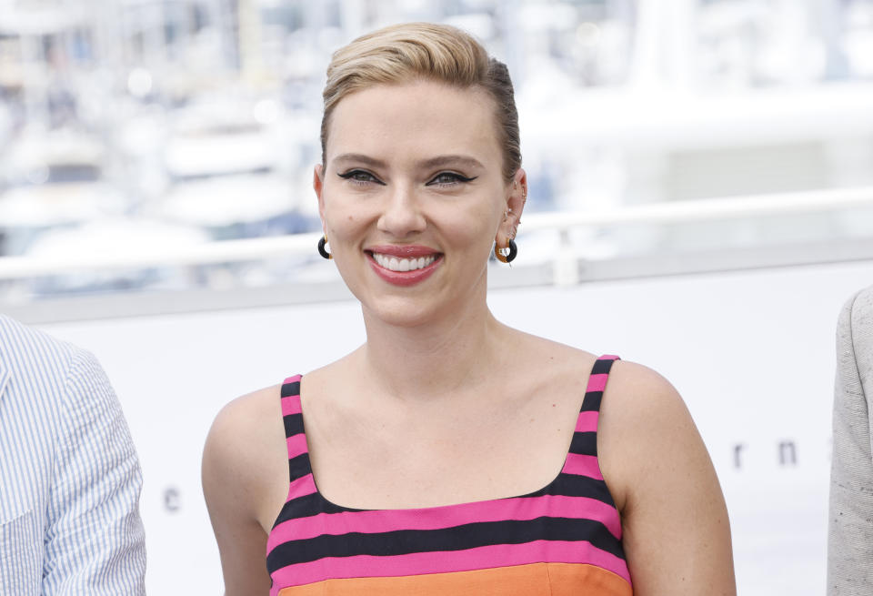FILE - Scarlett Johansson poses for photographers at the photo call for the film "Asteroid City" at the 76th international film festival in Cannes, southern France, May 24, 2023. Johansson and NFL legend Dan Marino will star in the Super Bowl commercial that will focus on M&Ms candy being the comfort fun food while watching the big game. (Photo by Joel C Ryan/Invision/AP, File)