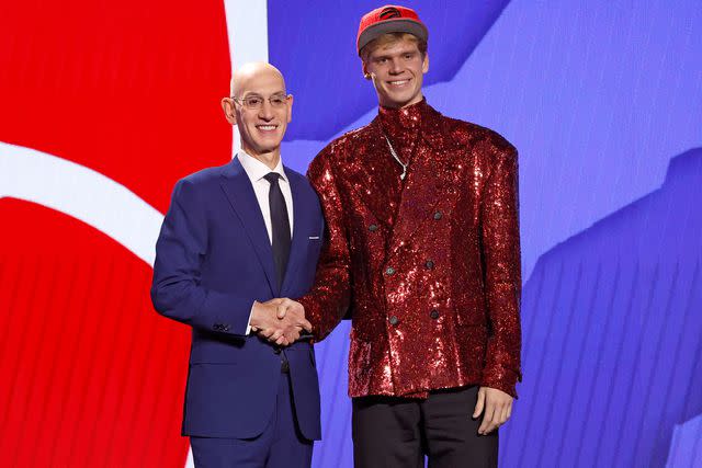 <p>Sarah Stier/Getty</p> From left: Adam Silver and Gradey Dick