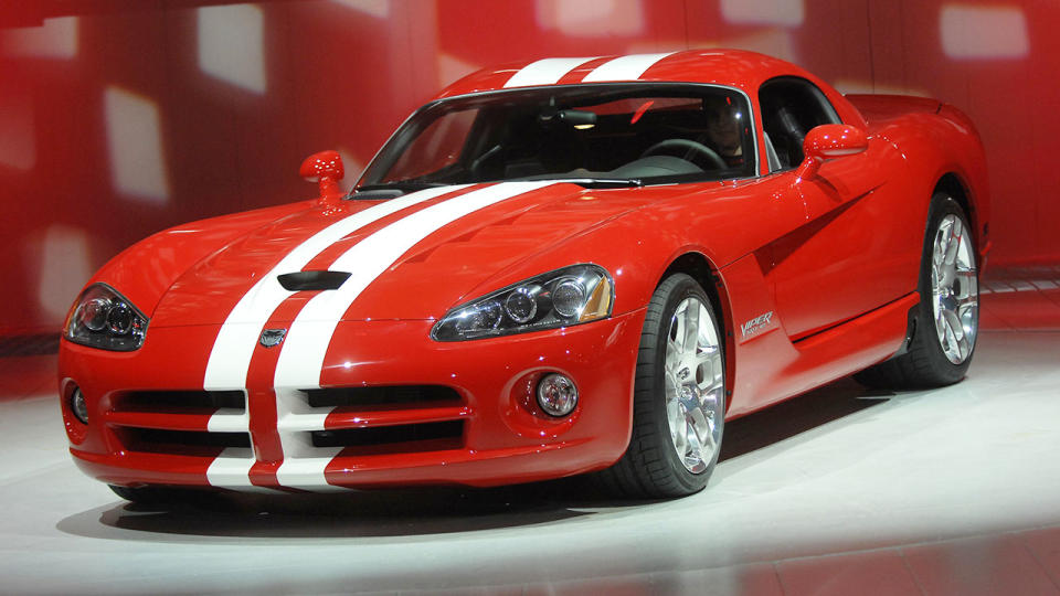 Pictured here, a Dodge Viper on display in a show room.