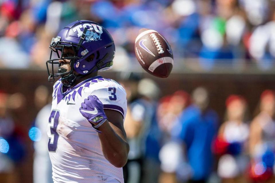 TCU Emari Demarcado tosses the football behind him after scoring a touchdown on Saturday, Sept. 24, 2022, at the Gerald Ford Stadium in the Southern Methodist University in Dallas, Texas.