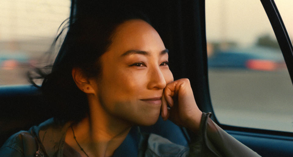This image released by A24 shows Greta Lee in a scene from "Past Lives." (Jon Pack/A24 via AP)