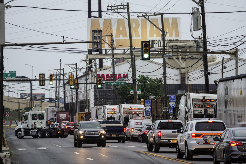 Traffic stands still in a neighborhood near an elevated section of Interstate 95 that collapsed, in Philadelphia, Monday, June 12, 2023. (AP Photo/Matt Rourke)