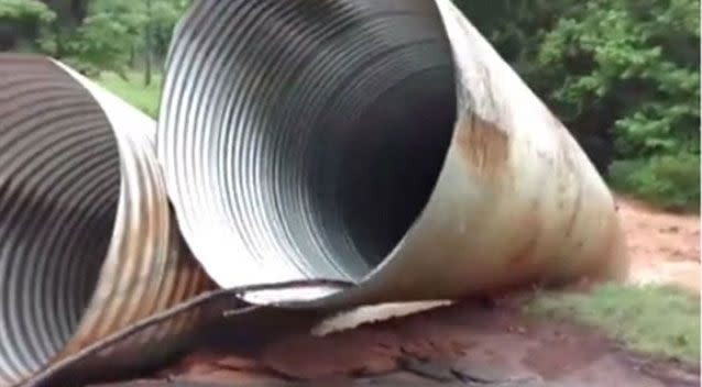 The pipes were carried into the flooded creek. Source: Facebook/Allen Laneigh Childers