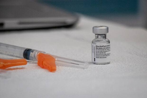 A syringe and vial of Pfizer-BioNTech vaccine is shown in Halifax. (Robert Short/CBC - image credit)