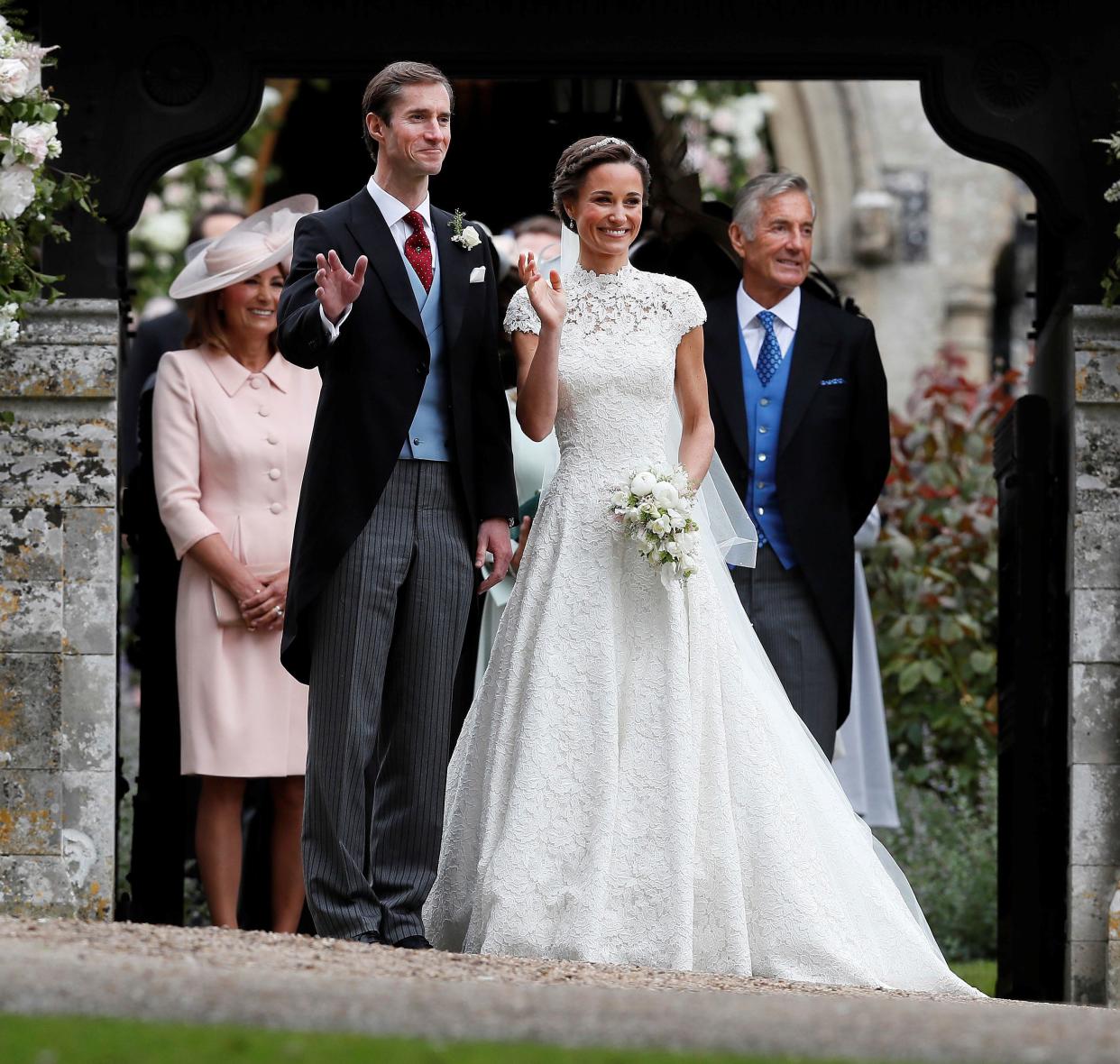James Matthews poses last spring with his new bride, Pippa Middleton, as James' father, David Matthews (right), looks on. (Photo: Reuters/pool)