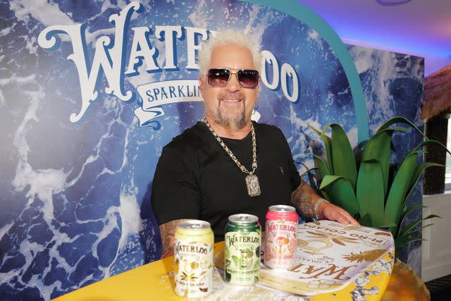 <p>Craig Barritt/Getty Images for Waterloo Sparkling Water</p> Guy Fieri with Waterloo's new summer flavors