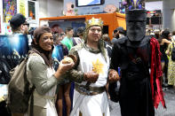 <p>Friends dress up to pay homage to <em>Monty Python and the Holy Grail</em> — complete with coconuts — at Comic-Con International on July 19, 2018, in San Diego. (Photo: Angela Kim/Yahoo Entertainment) </p>