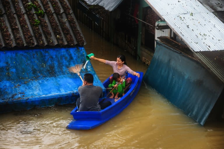 At least 12 people have died in Thailand as heavy rains continue to batter the flood-ravaged south with water roof-high in some areas