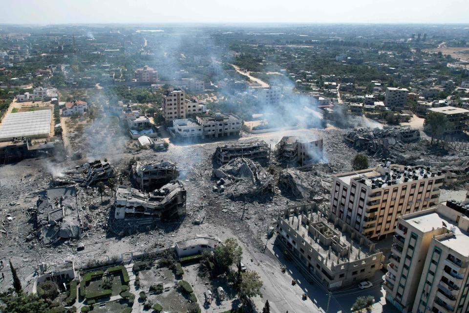 An aerial view shows destroyed buildings in al-Zahra city south of Gaza City on Oct. 20, 2023, following Israeli bombardment overnight amid ongoing battles between the Israeli military and the Palestinian militant group Hamas.